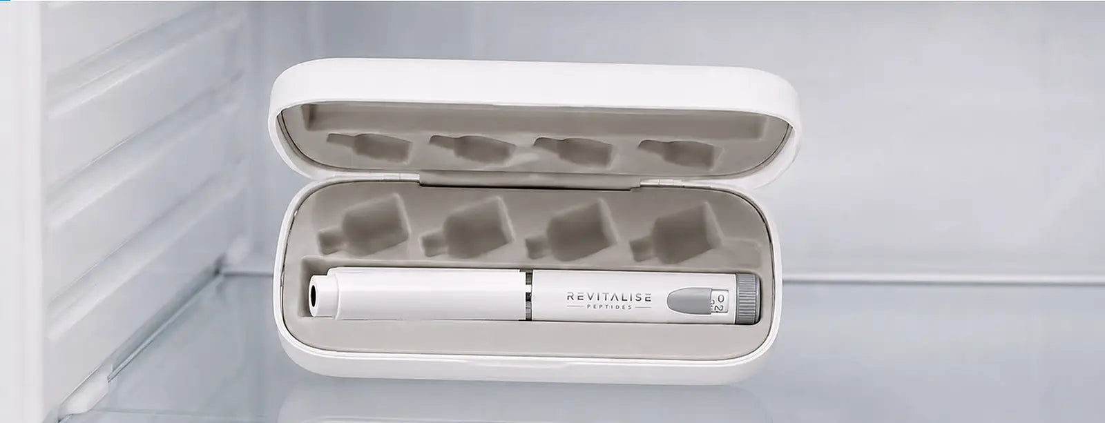 Place the complete capped pen in the open Revitalise case
